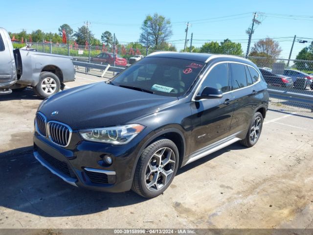 Photo 1 VIN: WBXHU7C3XJ5H43331 - BMW X1 