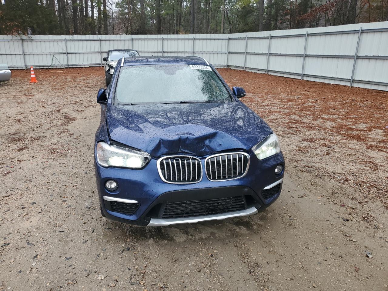 Photo 4 VIN: WBXHU7C3XJ5H44074 - BMW X1 