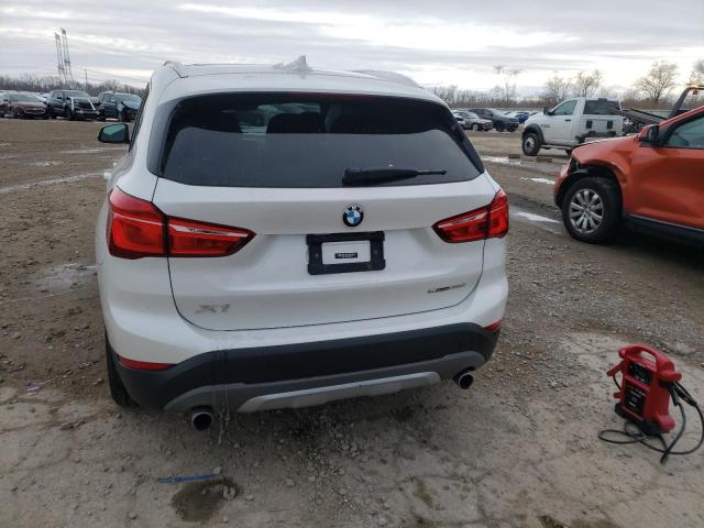 Photo 5 VIN: WBXHU7C3XJ5L08337 - BMW X1 