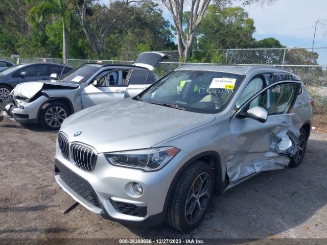 Photo 1 VIN: WBXHU7C50K3H45068 - BMW X1 