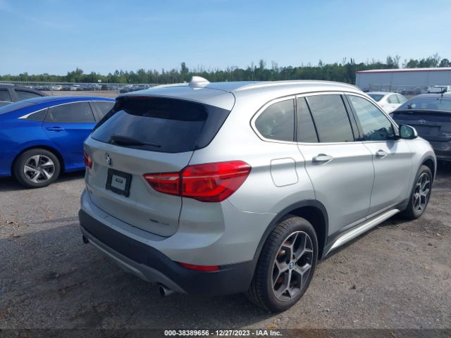 Photo 3 VIN: WBXHU7C50K3H45068 - BMW X1 