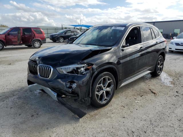 Photo 0 VIN: WBXHU7C50K3H45359 - BMW X1 