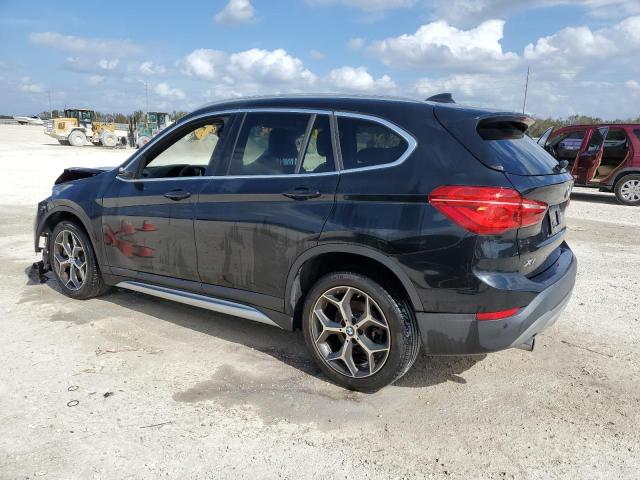 Photo 1 VIN: WBXHU7C50K3H45359 - BMW X1 