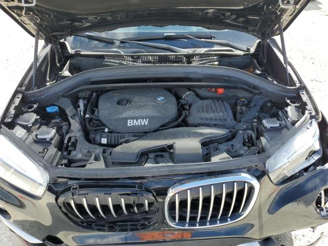 Photo 11 VIN: WBXHU7C50K3H45359 - BMW X1 