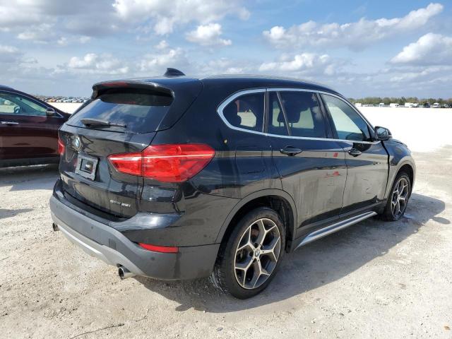 Photo 2 VIN: WBXHU7C50K3H45359 - BMW X1 