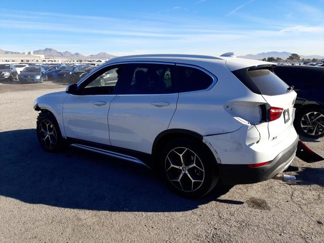 Photo 1 VIN: WBXHU7C50K3H45572 - BMW X1 