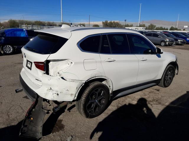 Photo 2 VIN: WBXHU7C50K3H45572 - BMW X1 