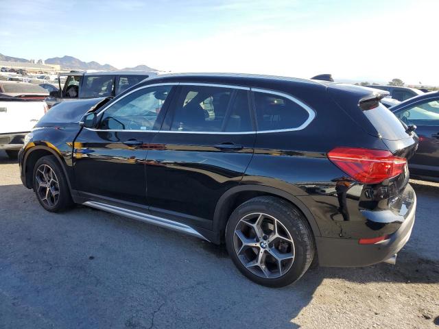 Photo 1 VIN: WBXHU7C50K5L10536 - BMW X1 