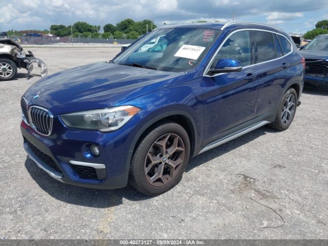 Photo 1 VIN: WBXHU7C51K3H44625 - BMW X1 