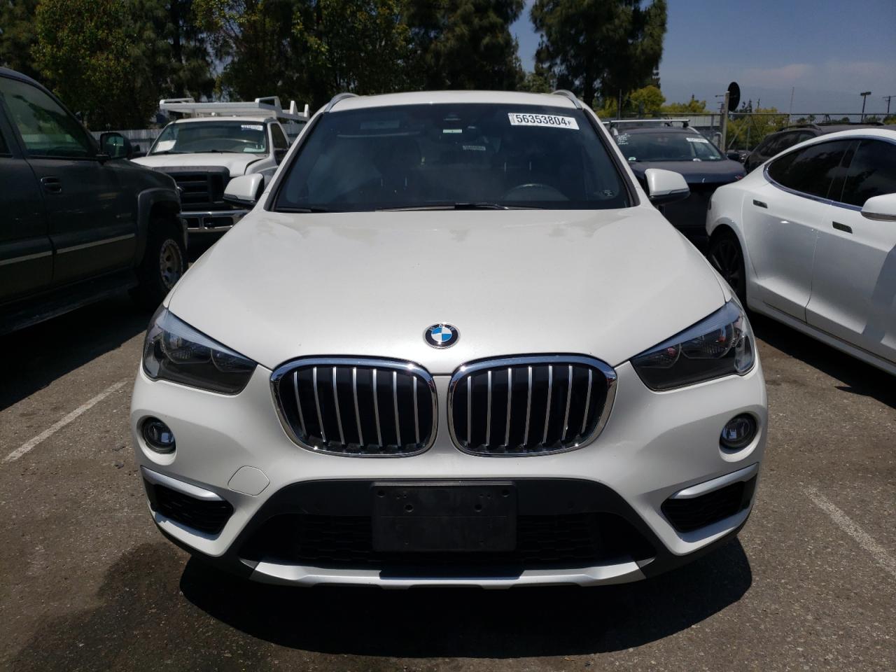 Photo 4 VIN: WBXHU7C51K5L10903 - BMW X1 