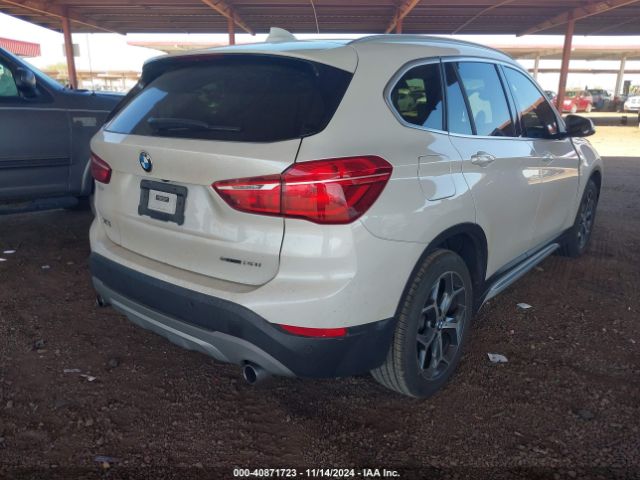 Photo 3 VIN: WBXHU7C51K5N37606 - BMW X1 