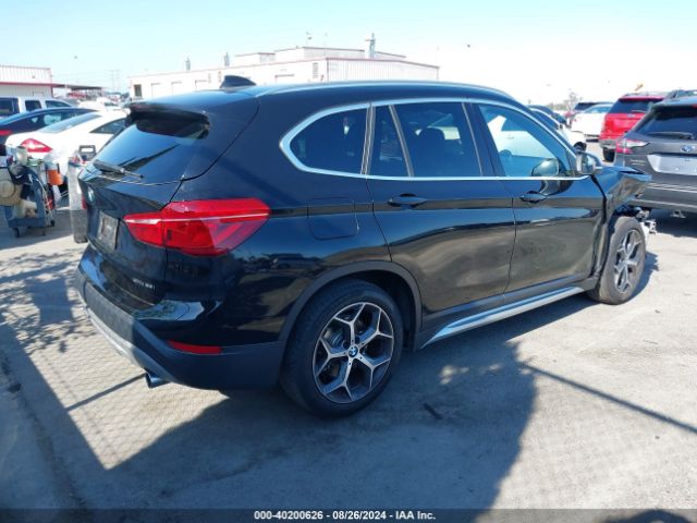 Photo 3 VIN: WBXHU7C52K3H44472 - BMW X1 