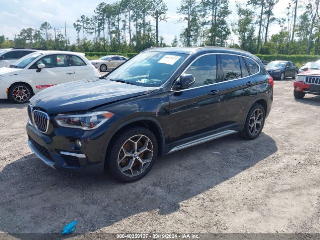 Photo 1 VIN: WBXHU7C54K3H45459 - BMW X1 