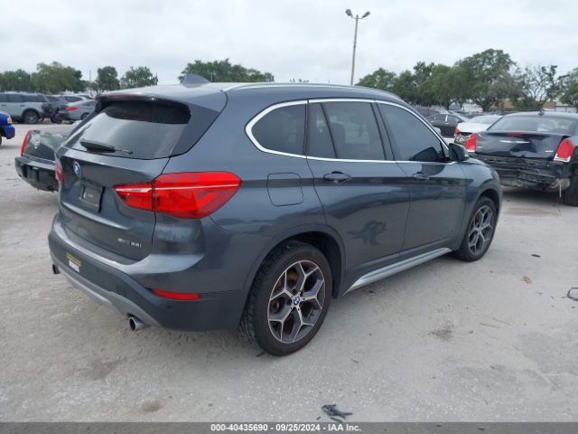 Photo 3 VIN: WBXHU7C54K3H45509 - BMW X1 