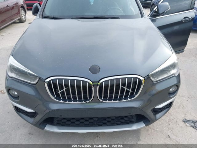 Photo 5 VIN: WBXHU7C54K3H45509 - BMW X1 