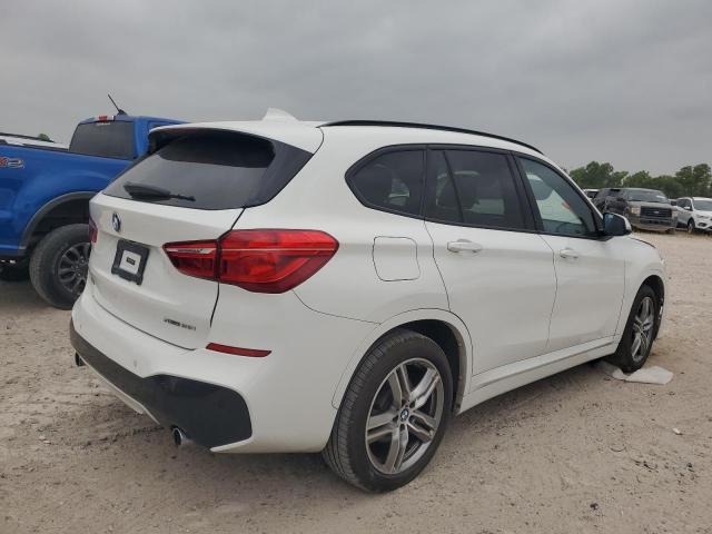 Photo 2 VIN: WBXHU7C54K5L10409 - BMW X1 