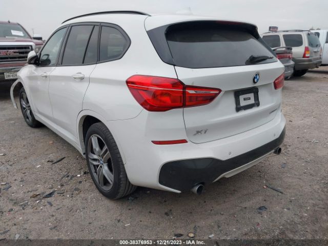 Photo 2 VIN: WBXHU7C54K5L10409 - BMW X1 