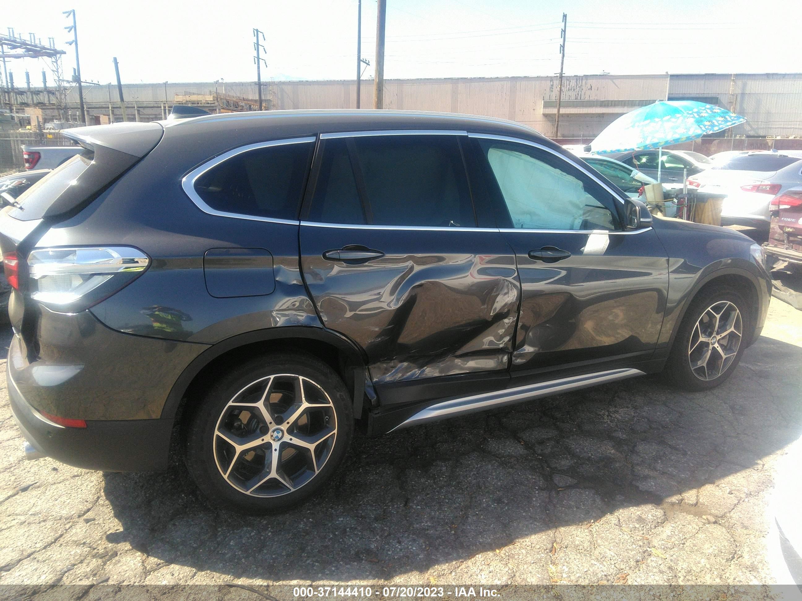 Photo 12 VIN: WBXHU7C54K5L11799 - BMW X1 