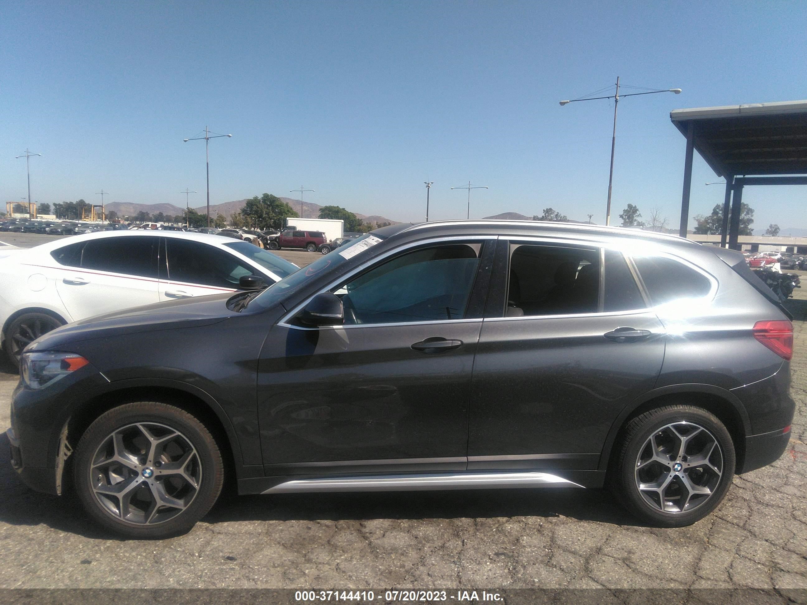 Photo 13 VIN: WBXHU7C54K5L11799 - BMW X1 