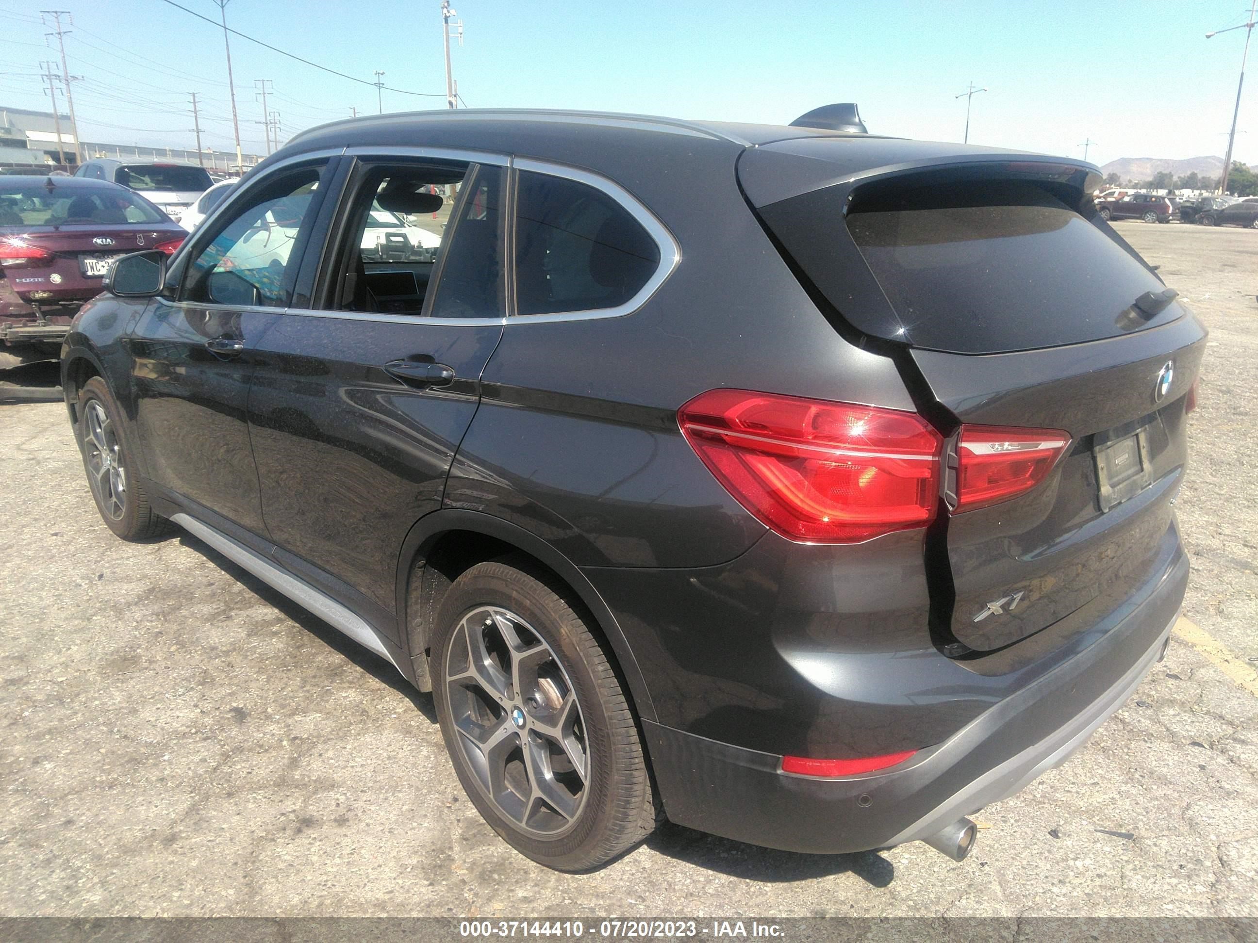 Photo 2 VIN: WBXHU7C54K5L11799 - BMW X1 