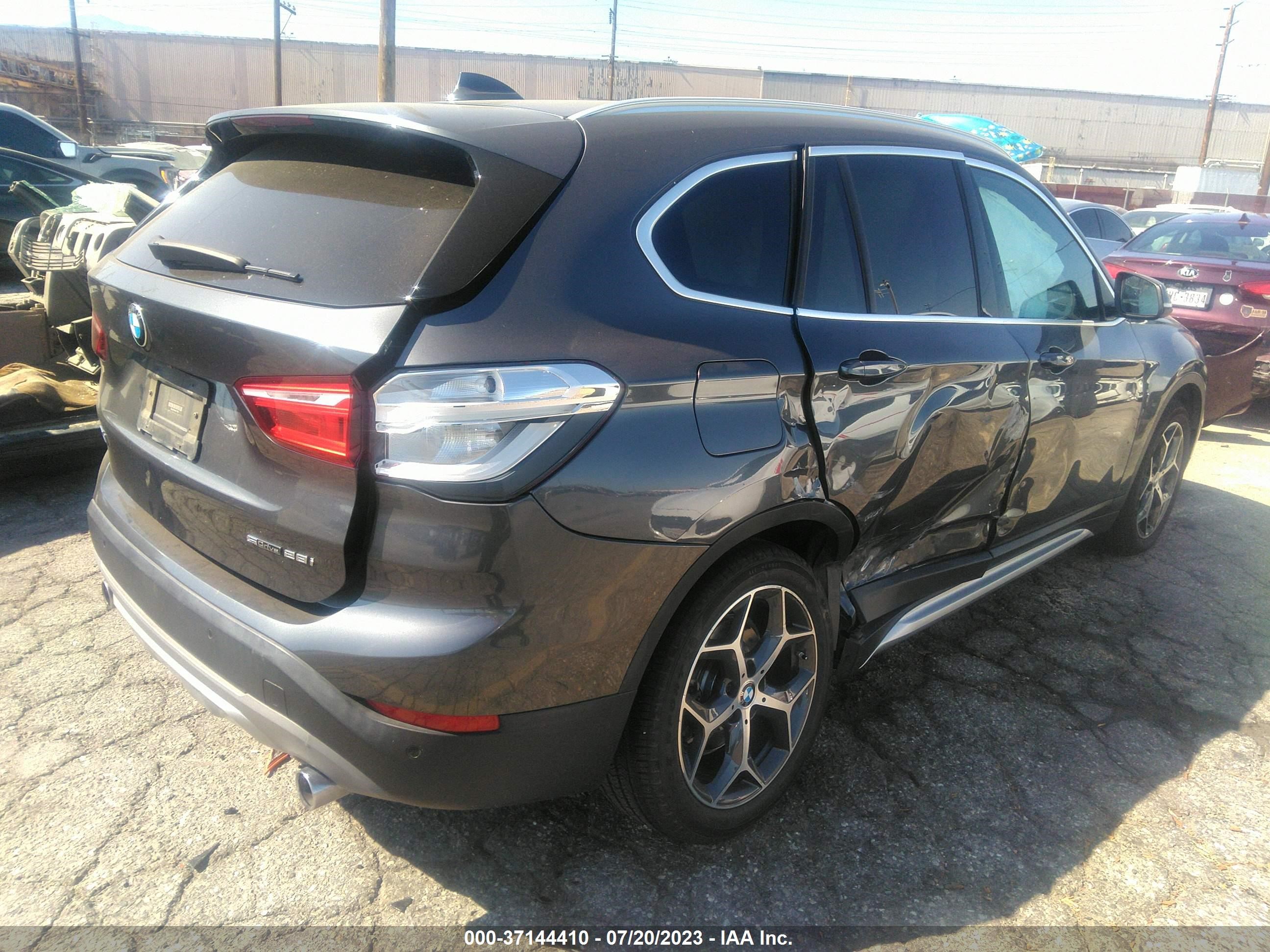 Photo 3 VIN: WBXHU7C54K5L11799 - BMW X1 