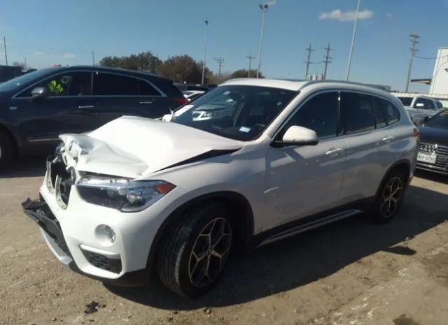 Photo 1 VIN: WBXHU7C56K3H46435 - BMW X1 