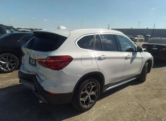 Photo 3 VIN: WBXHU7C56K3H46435 - BMW X1 