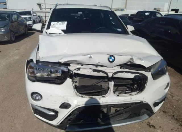 Photo 5 VIN: WBXHU7C56K3H46435 - BMW X1 