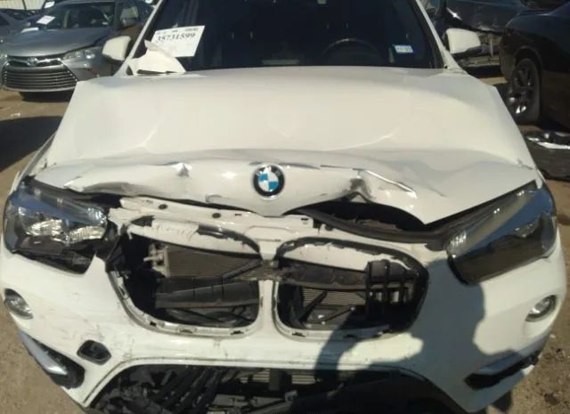 Photo 9 VIN: WBXHU7C56K3H46435 - BMW X1 