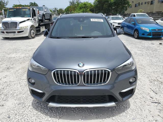 Photo 4 VIN: WBXHU7C56K5L11867 - BMW X1 