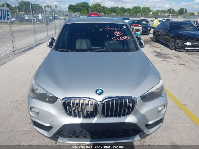 Photo 5 VIN: WBXHU7C57K5L11036 - BMW X1 