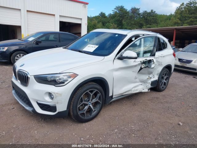 Photo 1 VIN: WBXHU7C57K5N42373 - BMW X1 