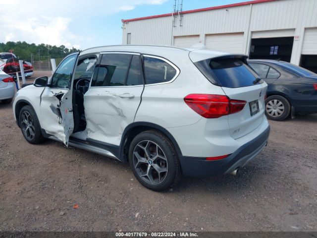 Photo 2 VIN: WBXHU7C57K5N42373 - BMW X1 