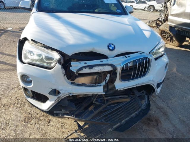 Photo 5 VIN: WBXHU7C58K5L11336 - BMW X1 