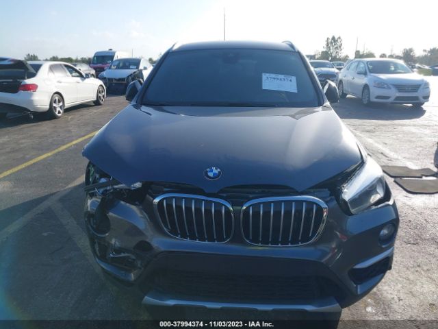 Photo 5 VIN: WBXHU7C58K5N25839 - BMW X1 