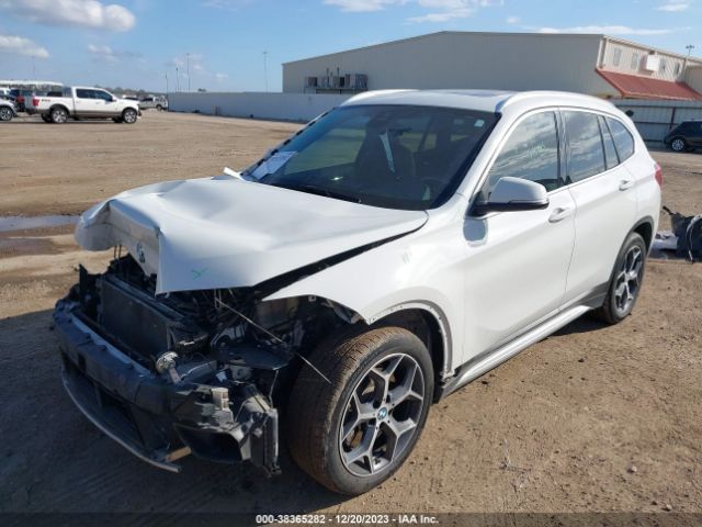 Photo 1 VIN: WBXHU7C59K5L09854 - BMW X1 