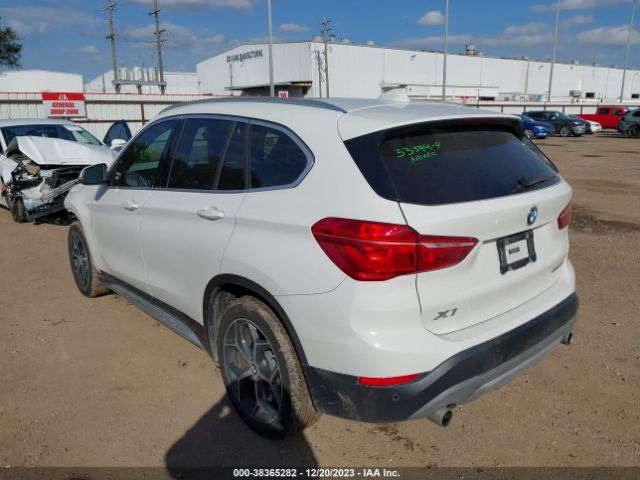 Photo 2 VIN: WBXHU7C59K5L09854 - BMW X1 