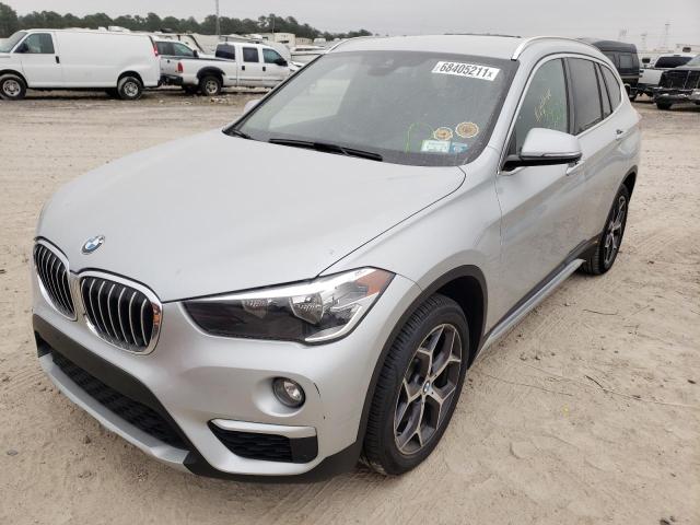 Photo 1 VIN: WBXHU7C59K5L10079 - BMW X1 