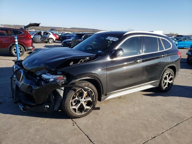 Photo 0 VIN: WBXHU7C59K5L10437 - BMW X1 