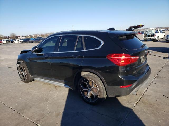 Photo 1 VIN: WBXHU7C59K5L10437 - BMW X1 