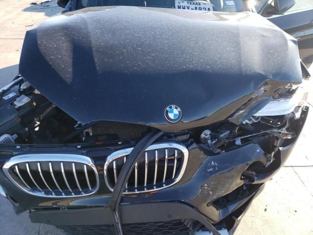 Photo 11 VIN: WBXHU7C59K5L10437 - BMW X1 