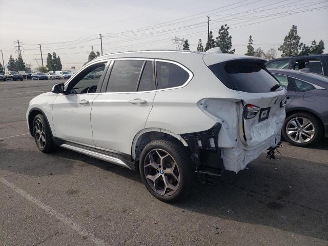 Photo 1 VIN: WBXHU7C59K5L12138 - BMW X1 