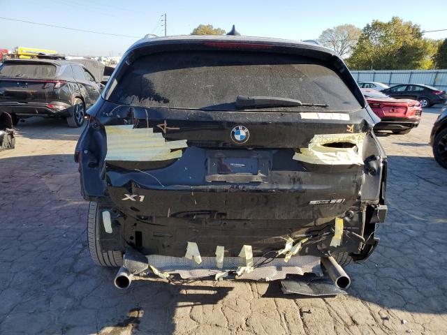 Photo 5 VIN: WBXHU7C5XK3H45692 - BMW X1 