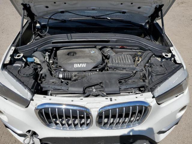 Photo 11 VIN: WBXHU7C5XK3H46230 - BMW X1 