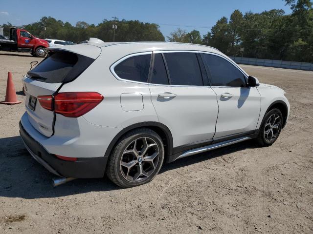 Photo 2 VIN: WBXHU7C5XK3H46230 - BMW X1 