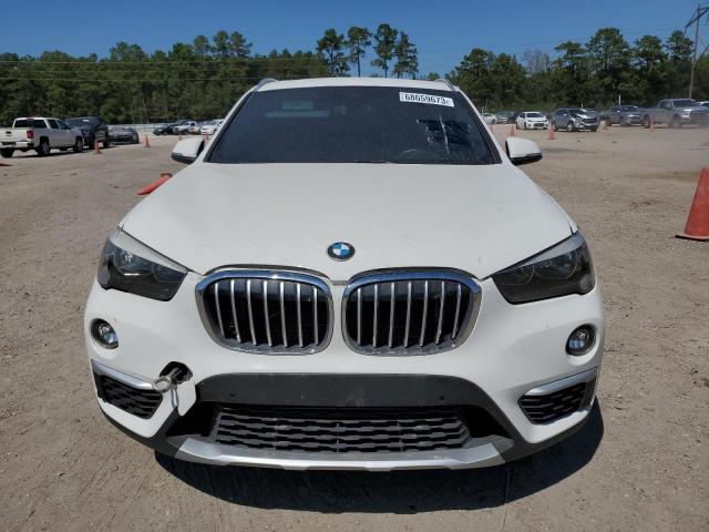 Photo 4 VIN: WBXHU7C5XK3H46230 - BMW X1 