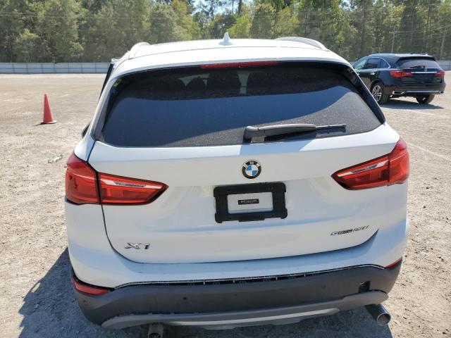 Photo 5 VIN: WBXHU7C5XK3H46230 - BMW X1 