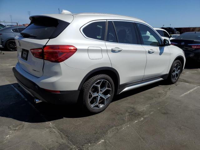 Photo 2 VIN: WBXHU7C5XK5L09877 - BMW X1 SDRIVE2 