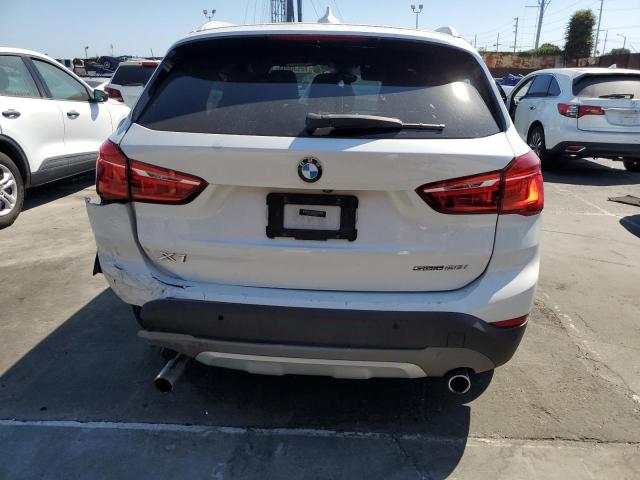 Photo 5 VIN: WBXHU7C5XK5L09877 - BMW X1 SDRIVE2 