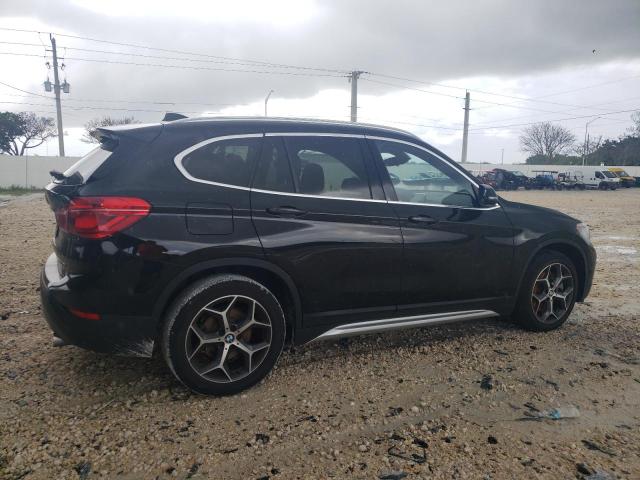 Photo 2 VIN: WBXHU7C5XK5L10396 - BMW X1 